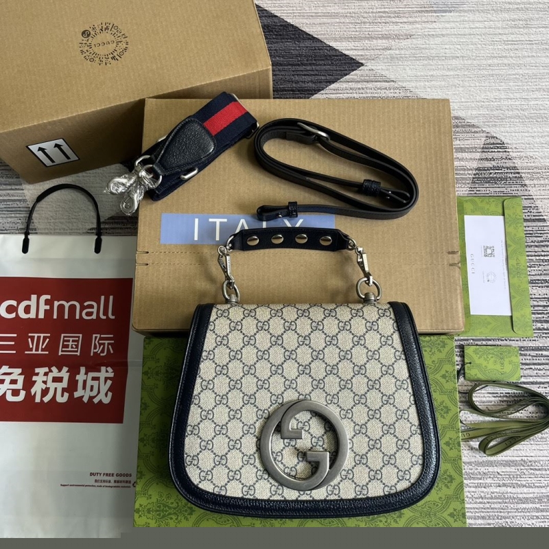G*u*i top handle bags